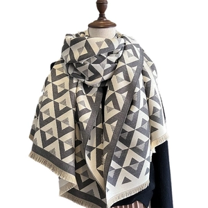 Fashionable V-pattern faux cashmere shawl with grey and white geometry and fringe