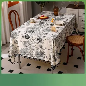 Linen cotton tablecloth with vintage black floral print and elegant fringe tassels