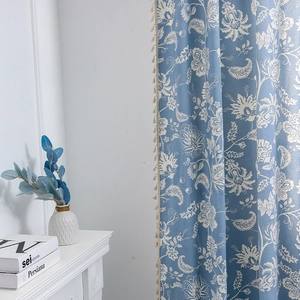 Nordic light luxury blue curtains with white floral paisley print and fringe detail