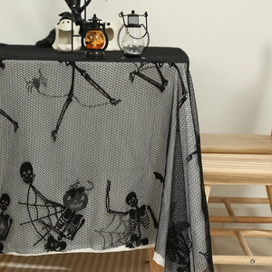 Halloween black lace tablecloth featuring skeletons, spiders and pumpkins decoration