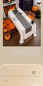 Detail view of black lace spider web runner over a white cloth for Halloween decor