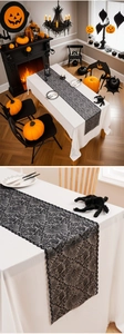 Close-up of black lace spider web table runner with intricate gothic hollow patterns