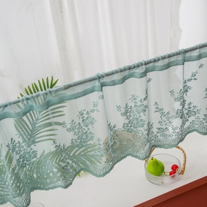 Fresh light green lace cafe curtain with delicate floral embroidery and scalloped edges