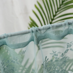Light blue floral lace curtain with rod pocket design and delicate mesh embroidery