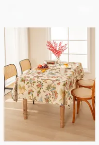 Detail of luxury bird and floral jacquard tablecloth with premium chenille fabric texture