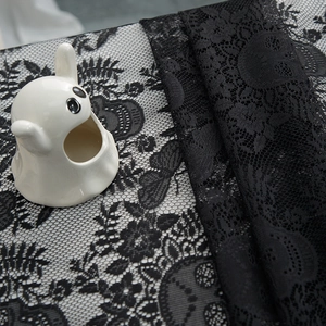 Halloween black lace tablecloth featuring gothic skull and floral patterns for party decor
