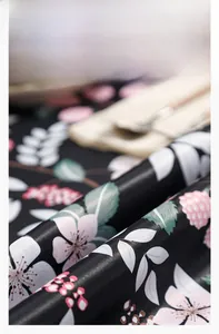 Detail of oil painting floral tablecloth showing soft drape and fine fabric texture