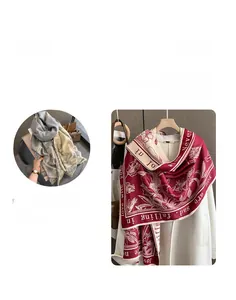Detail of printed winter scarf showing botanical patterns and vintage lettering design