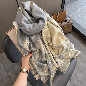 Thick warm winter scarf with vintage floral print and fringe details in grey and beige