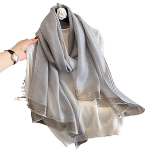 Elegant silver grey silk shawl with metallic glitter and luxury gold trim borders
