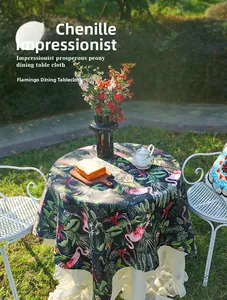 Close-up of tropical flamingo and floral patterns on premium chenille fabric table cloth
