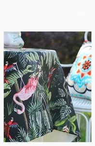 Detail of tropical flamingo floral tablecloth fabric showing soft elastic texture and seams