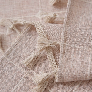Modern bohemian linen-cotton striped curtain with elegant tassel fringe details