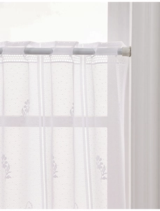 Close-up of white daisy lace curtain with delicate embroidery and rod pocket top
