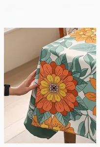 Close-up of vintage floral cotton linen tablecloth showing thick texture and drape