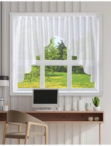 Detailed lace valance with delicate floral patterns and wavy hem for window decor