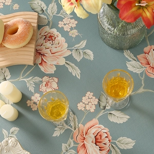 Thick linen tablecloth with vintage floral patterns for an elegant dining room setup