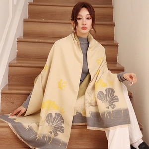 Detail of warm winter scarf showing lotus leaf pattern and soft tassel edges