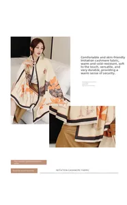 Detail of cashmere-like scarf showing orange lotus print and exquisite tassel trim