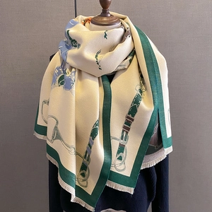 Vintage cashmere feel scarf with horse carriage pattern and tassels on gray background