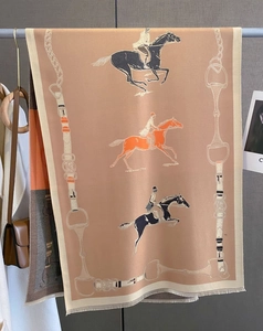 Detailed view of the equestrian pattern with horse riders and chain buckle design