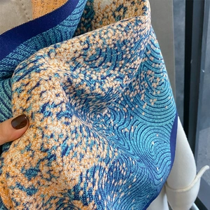 Detailed macro view of Starry Night patterned pashmina shawl showing soft knit texture