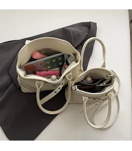 Macro detail of the spacious interior capacity of this corduroy tote bag set
