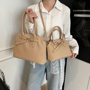 Chic beige pleated leather shell tote bag in large and small sizes with shoulder strap
