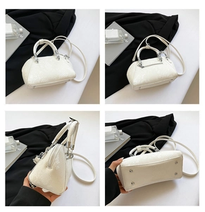 Detailed four-way view showing white snakeskin texture and silver hardware of the handbag