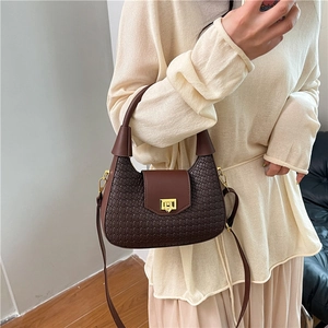 Dark brown woven leather crossbody bag with gold buckle and top handle for women