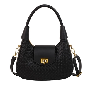 Classic black woven texture handbag with golden hardware and adjustable crossbody strap