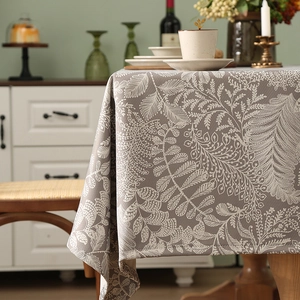 Thickened cotton linen tablecloth with elegant white leaf patterns in a warm brown tone