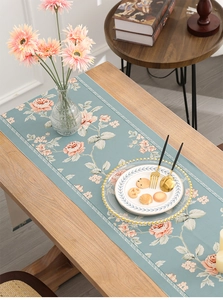 Detailed close-up of thickened waterproof table runner with pink rose floral prints