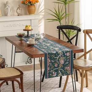 Luxurious floral table runner in dark green waterproof fabric with vintage botanicals