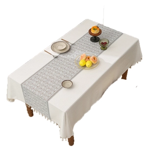 French lace tablecloth with waffle texture and geometric tassel pattern for dining