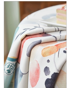 Macro view of thickened cotton linen tablecloth showing artistic print and woven texture