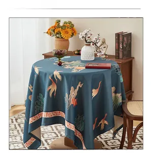 Close-up of crane and cloud patterns on a blue Chinese style waterproof tablecloth