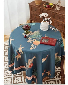 Detailed pattern of deep blue Chinese round tablecloth with cranes and sun landscape
