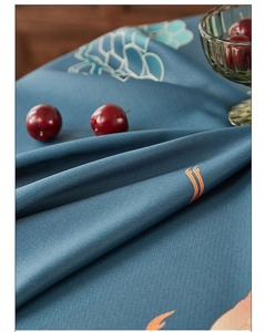 Close-up of premium dark blue linen tablecloth featuring classical patterns and soft texture
