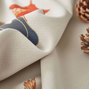 Close-up of thick linen tablecloth showing traditional oriental pattern and rich texture
