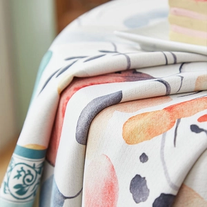 Thick waterproof linen tablecloth with abstract watercolor print in orange and teal