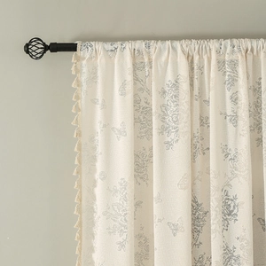 Floral print cream curtain with gray roses, butterflies and decorative tassel edge