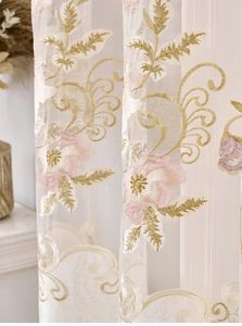 Detail of European embroidered white sheer curtain with pink floral and golden leaf patterns
