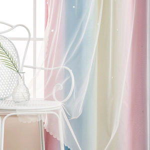 Detail of gradient rainbow curtains with double-layer hollow star patterns for kids' rooms