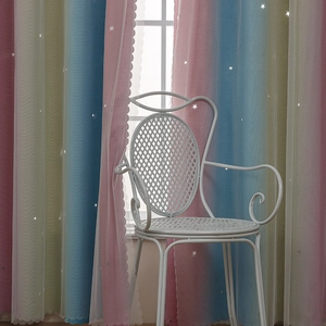 Detailed macro of rainbow gradient double-layer curtains with hollow star pattern and wavy edge