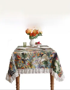 Detail of vintage oil painting tablecloth with thick waterproof fabric and lace edges