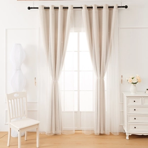 Detail of cream double-layer curtains with hollow stars and lace edge for kids room