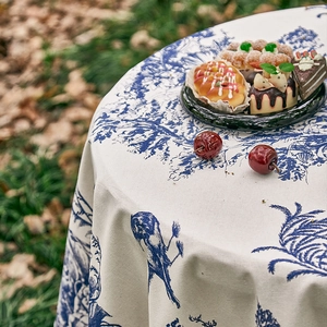 Blue Toile de Jouy round tablecloth with vintage French pastoral patterns on white linen