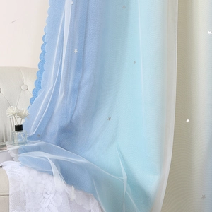 Close-up of double-layer gradient curtains featuring hollow stars and lace edges