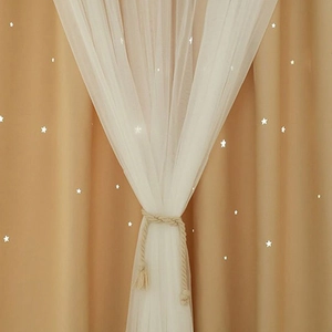 Double-layer star pattern curtains with sheer white mesh and khaki blackout fabric